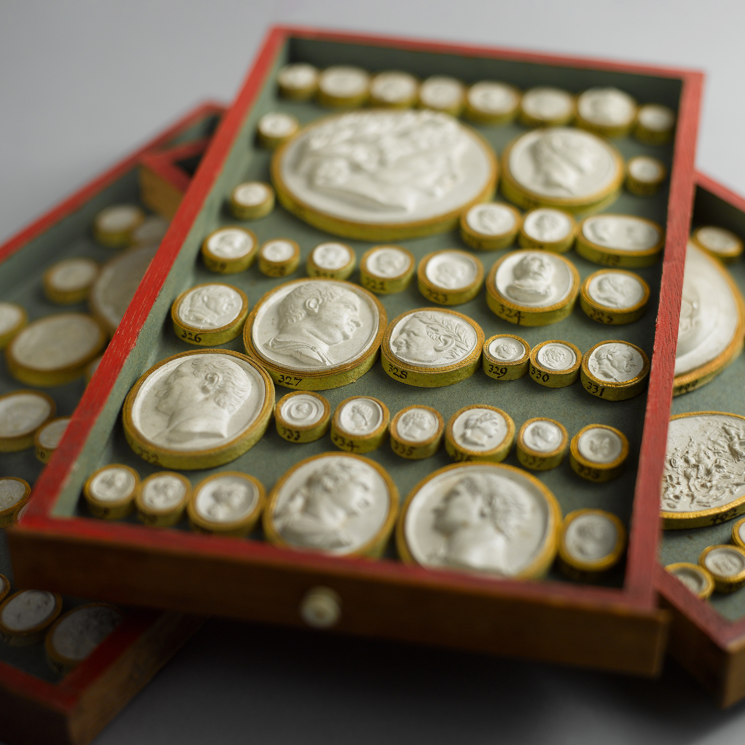 Philipp Daniel Lippert (1702–85), Three book-shaped collector's cabinets, details inside